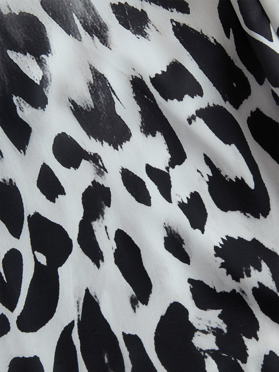 RAIA | CONJUNTO CAMISETA BLANCA Y PANTALÓN LEOPARDO