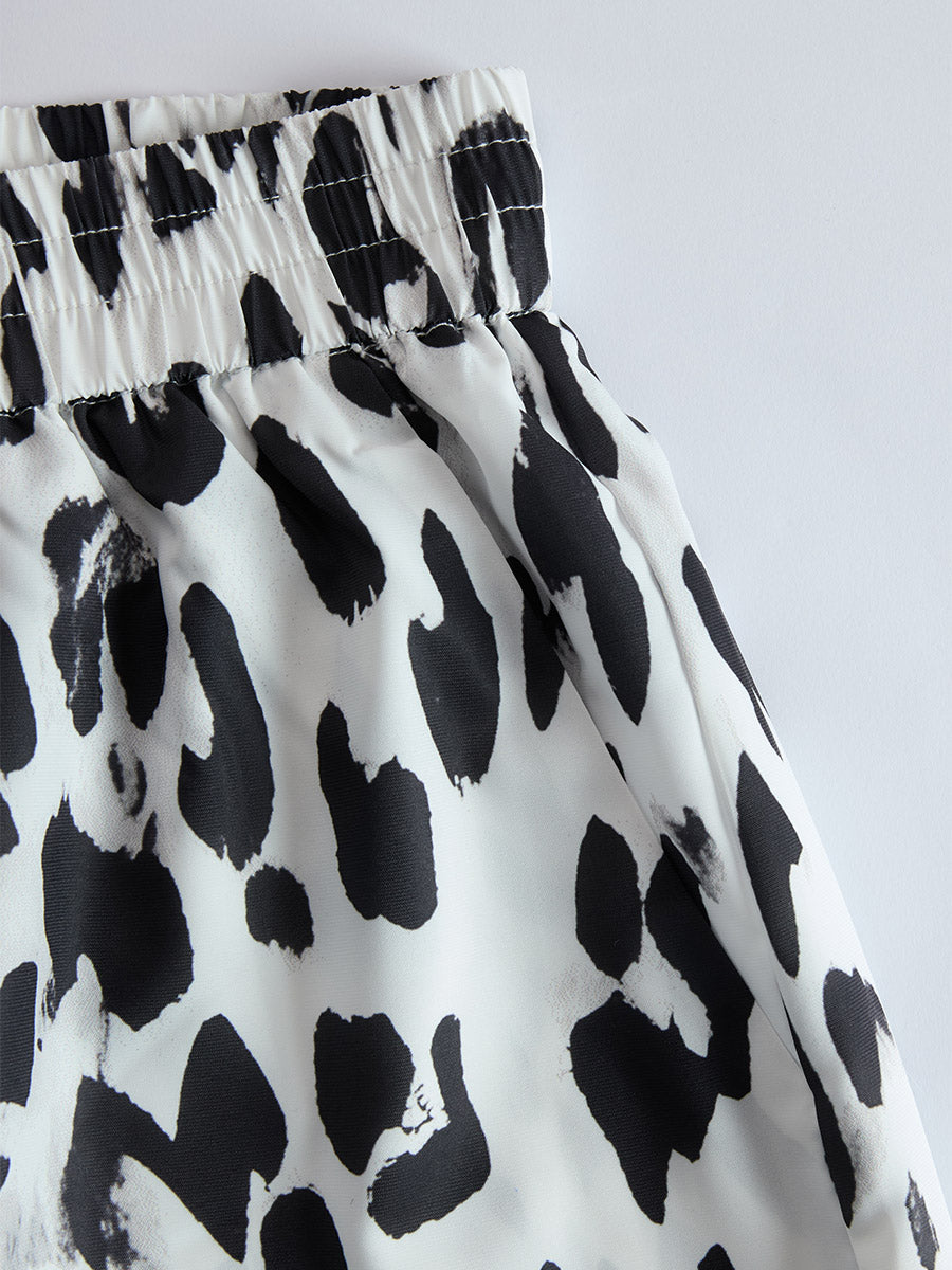 RAIA | CONJUNTO CAMISETA BLANCA Y PANTALÓN LEOPARDO