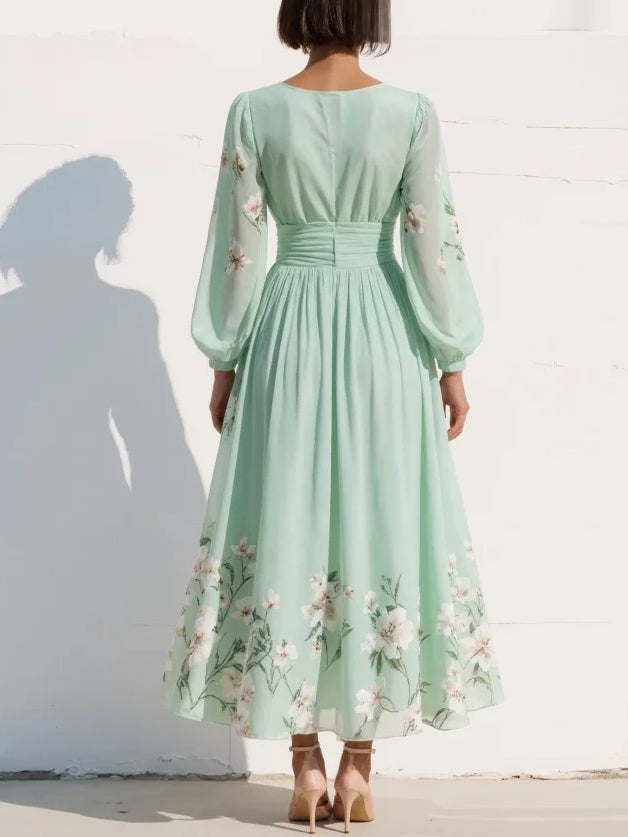 FLORA ∙ VESTIDO MAXI PLISADO DE GASA AZUL CELESTE CON ESTAMPADO FLORAL