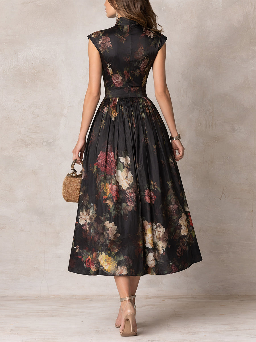 VIOLETA ∙ VESTIDO MIDI DE SATÉN PLISADO NEGRO CON MOTIVO FLORAL Y ESCOTE EN LÁGRIMA